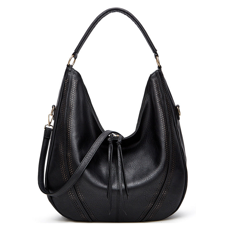 CALLY OVERSIZED VEGAN LEATHER HOBO BAG