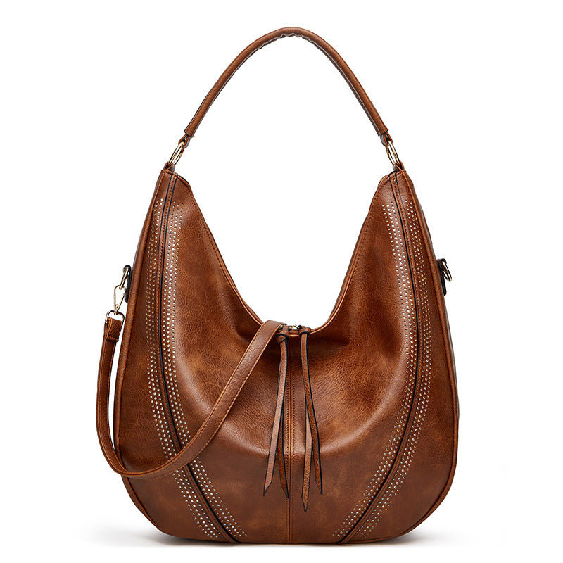 CALLY OVERSIZED VEGAN LEATHER HOBO BAG